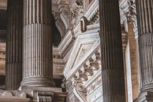 Neoclassical courthouse columns - criminal defense against rape charges in Austria